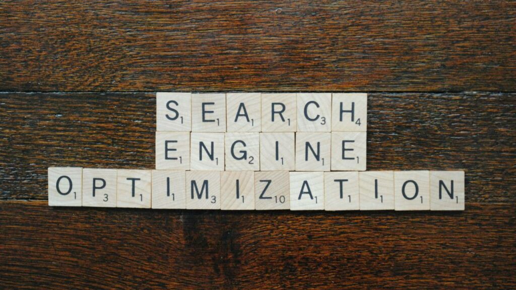 Small wooden squares spelling the term "search engine optimization" 